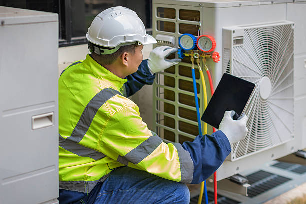 Professional Hvac Maintenance technician working in Plainville, MA
